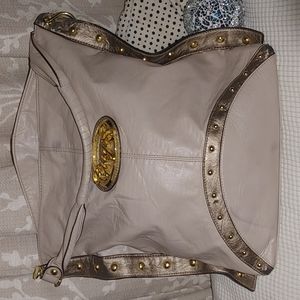 EUC tan leather purse with embellishments